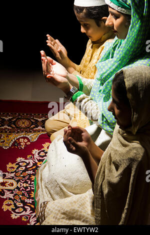 indian Muslim mother and kids Namaz Stock Photo