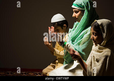 indian Muslim mother and kids Namaz Stock Photo