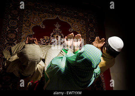 indian Muslim mother and kids Namaz Stock Photo