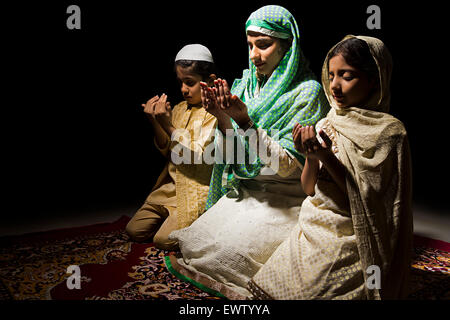 indian Muslim mother and kids Namaz Stock Photo