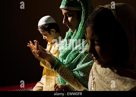 indian Muslim mother and kids Namaz Stock Photo