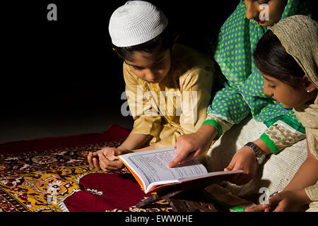 indian Muslim mother and kids Namaz Stock Photo