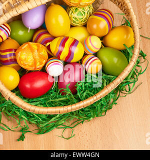 Basket full of colorful Easter eggs Stock Photo