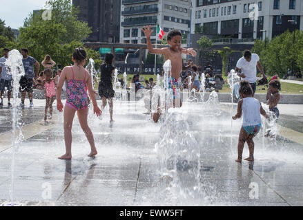 Children cooling off in fountains near Birmingham city centre, as the UK experienced a July record high temperature of 36.7C. Credit:  Andrew Fox/Alamy Live News Stock Photo