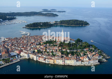 AERIAL VIEW. The Church of St. Euphemia crowning the old town of Rovinj (also named Rovigno) standing on a picturesque peninsula. Istria, Croatia. Stock Photo