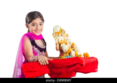 1 indian Marathi child girl Ganpat Sculpture Worship Stock Photo