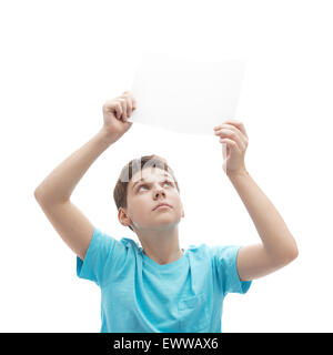 Young boy with a sheet of paper Stock Photo