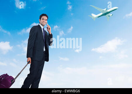 1 indian Business Man Passenger talking Cell Phone Stock Photo