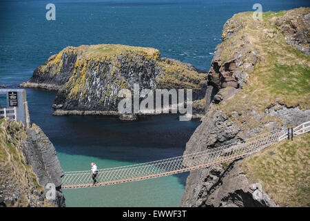 Crossing Carrick a Rede rope bridge, a suspension bridge which spans 20 metres from the mainland to the tiny Carrick Island. Thi