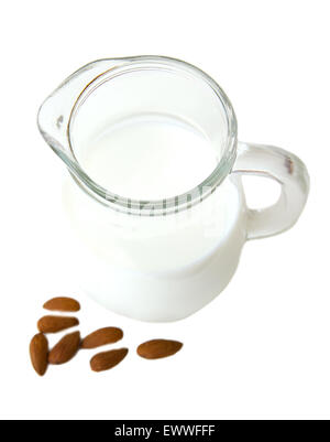 Almond milk in jug on a white background seen from above Stock Photo