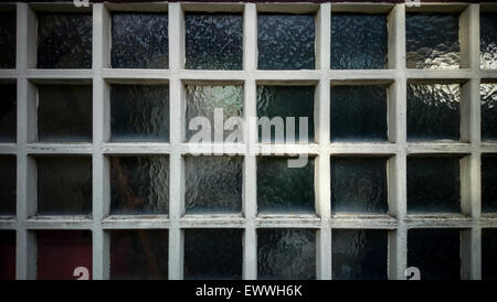 Dirty wall from square wooden frame and glass as background Stock Photo
