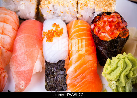 Various fish sushi with salmon ikura, close up, top view Stock Photo