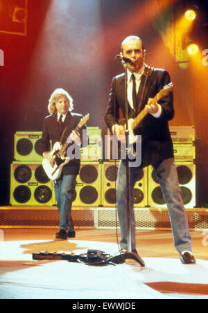 STATUS QUO  UK rock group with Rick Parfitt at left and Francis Rossi in 1996.  Photo Robert lewis Stock Photo