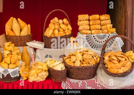 Freshly prepared food produce for sale, displayed on a market stall in the Old Town, Krakow, Poland Stock Photo