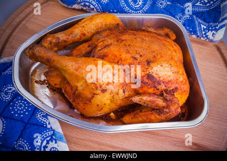 Baked fried chicken in aluminum dish, top view Stock Photo