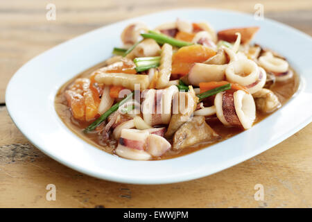 famous thai food, stir fried squid with salted egg yolk Stock Photo