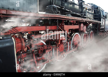 Steam Engine Rolling Steam locomotive rolling by close Stock Photo - Alamy