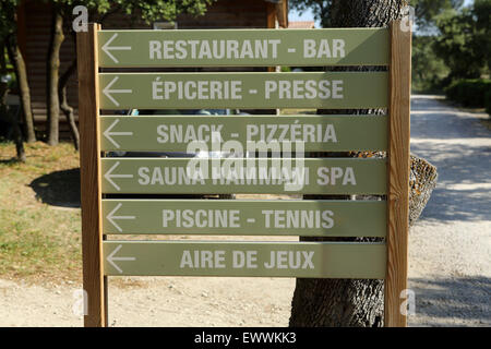 A sign for facilities at the Domaine de Massereau campsite in Sommieres, France. Stock Photo