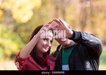 Hands Forming Heart Shape Stock Photo
