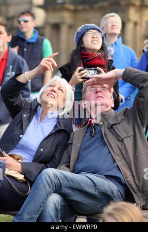 A man and woman look skywards Stock Photo