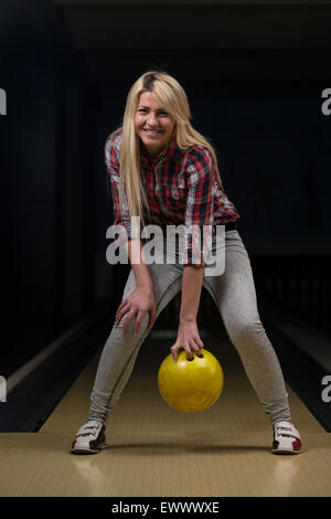 Beginner Aiming To Bowling Pins Stock Photo