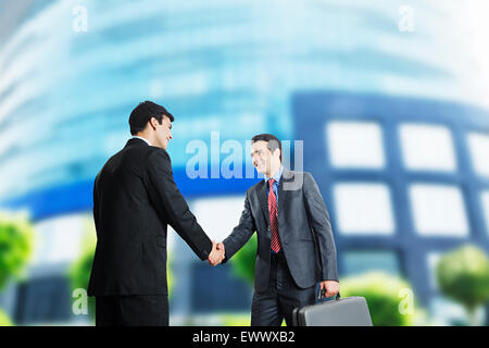 2 indian Business partner Handshake Dealing Stock Photo