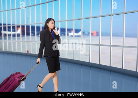 1 indian Business woman Passenger talking Cell Phone Stock Photo