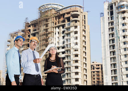 3 indian Architect Construction Site Checking Stock Photo