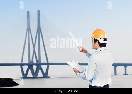1 indian Architect man Construction Site Checking Stock Photo