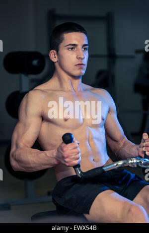 Back Exercises On A Seated Row Machine Stock Photo