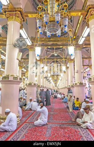 MEDINA-MAR 8 : Interior of Masjid Nabawi March 8, 2015 in Medina, Saudi Arabia. Nabawi Mosque is the second holiest mosque in Is Stock Photo