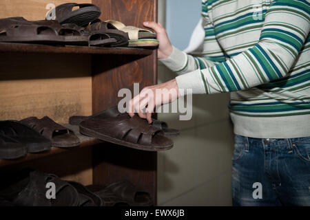 Muslim Man Preparing To Take Ablution In Mosque Stock Photo