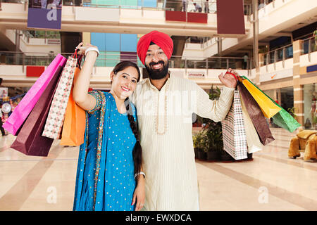 2 indian Punjabi Married Couple mall shopping Stock Photo - Alamy