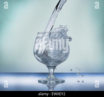 Frozen water splash in a glass Stock Photo