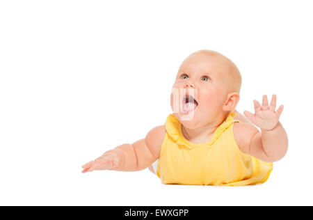Chubby laughing baby laying on the belly alone Stock Photo