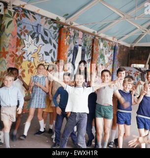 Children of Hargrave Park Junior School playing in their newly decorated playground, painted by the College of Art, free of charge. 25th June 1970. Stock Photo