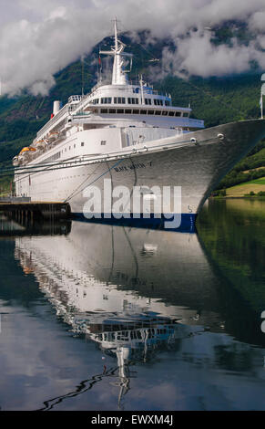 The Fred Olsen Line cruise ship Black Watch docked in the small Norweigian port of Olden
