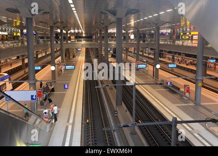 Inside Hauptbahnhof central railway station, Berlin, Germany. People on platform. Stock Photo