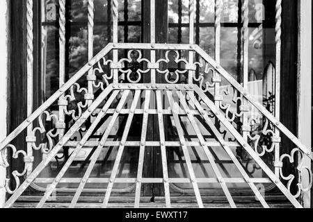 grate of a window of an ancient monastery Stock Photo