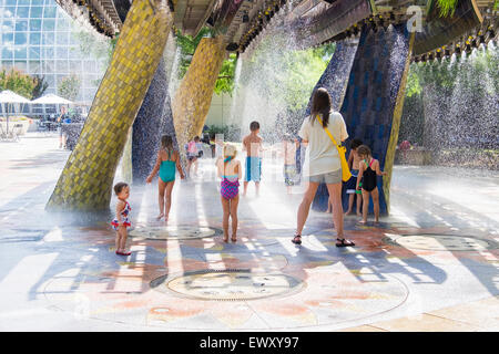 Children play at a splash park at the Myriad Botanical Gardens in Oklahoma City, Oklahoma, USA. Stock Photo