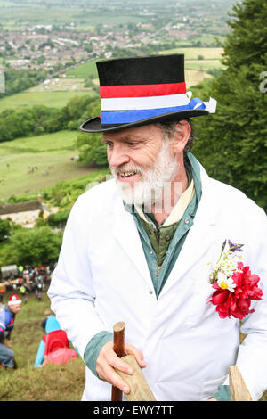 Master of Ceremonies. He gives the starters orders and rolls the cheeses.Cheese Rolling at Coopers Hill, Brockworth, Gloucesters Stock Photo