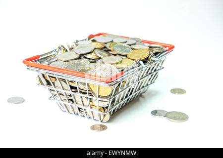 Coins inside basket Stock Photo