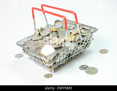 Coins inside basket Stock Photo