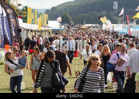 People peruse the trade stands on a busy day at Chatsworth Country Fair, Peak District, Derbyshire England UK - 2014 Stock Photo