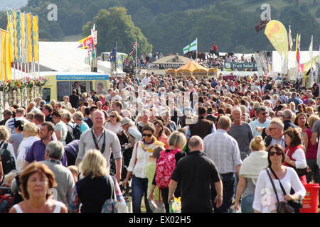 People peruse the trade stands on a busy day at Chatsworth Country Fair, Peak District, Derbyshire England UK - 2014 Stock Photo