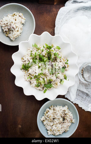 Still life with bowls of tuna and rice salad Stock Photo