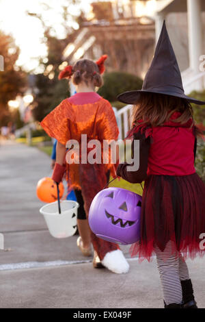 Children going trick or treating Stock Photo