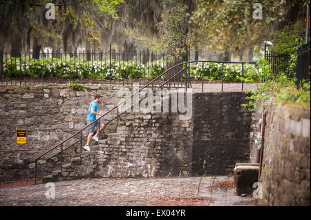 Jogger along the river walk, Savannah, Georgia, USA Stock Photo