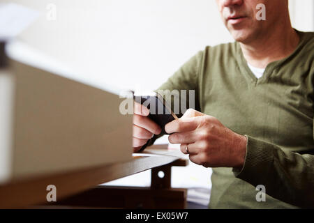 Man using smartphone Stock Photo