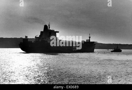 The Atlantic Conveyor, a British merchant navy ship, was requisitioned during the Falklands War. She was hit on 25 May 1982 by two Argentine air-launched AM39 Exocet missiles, killing 12 sailors. Pictured as she left Liverpool for war. Merseyside, 16th Ap Stock Photo